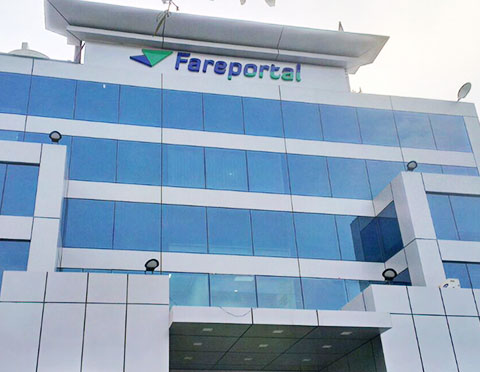 Commercial project — corporate office fit-out with open-plan workstations and exposed ceiling services